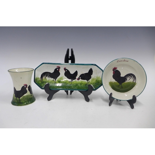 125 - Wemyss Ware, Robert Heron & Son, black cockerel with hens comb tray, 24.5 x 9.5cm, together with a s... 