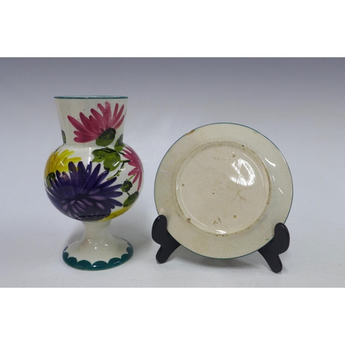 133 - Wemyss chrysanthemum vase, 15cm, with a repaired rim chip, together with a Wemyss strawberry dish (2... 