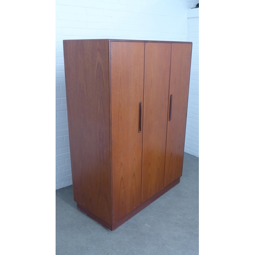 206 - G Plan - Fresco Range - A teak three door  wardrobe, 128 x 175 x 59cm.