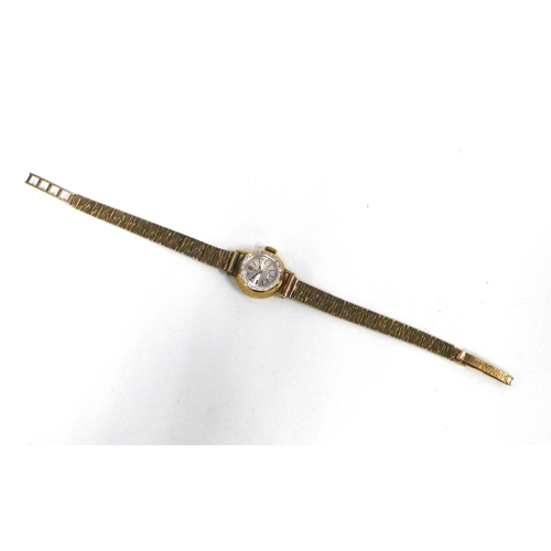 24 - Ladies vintage 9ct gold Omega wristwatch on a 9ct gold textured bracelet strap, Sheffield 1973