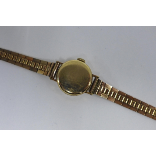 24 - Ladies vintage 9ct gold Omega wristwatch on a 9ct gold textured bracelet strap, Sheffield 1973