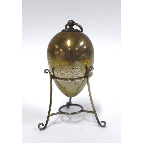 36 - An 18th century egg shaped box with engraved initials and dated 1735 together with a white metal sta... 