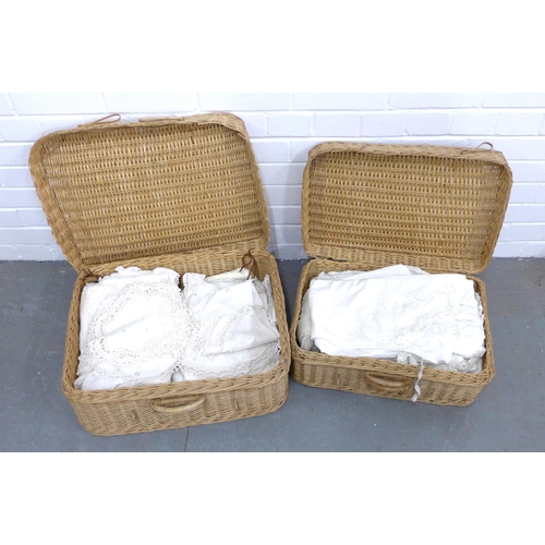 398 - Two wicker baskets, one containing white cotton nightwear and the other vintage table linens and cro... 