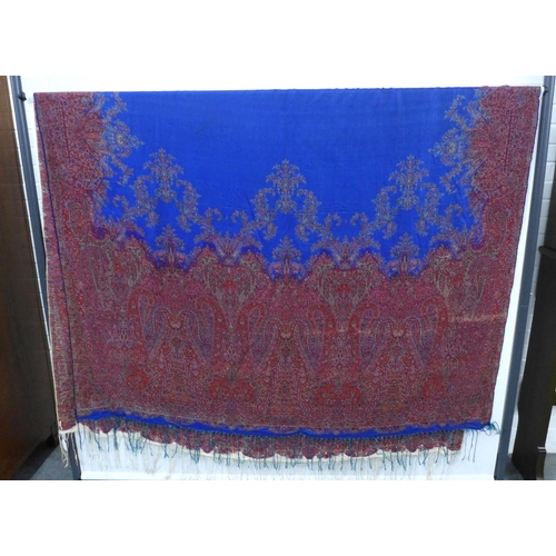 425 - 19th century French blue silk paisley shawl, finely woven with boteh border with a half section blue... 