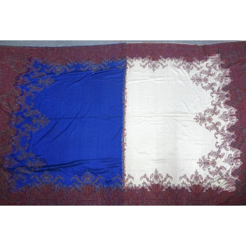 425 - 19th century French blue silk paisley shawl, finely woven with boteh border with a half section blue... 