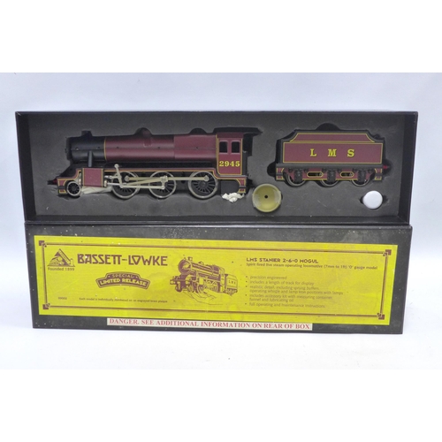 428 - Bassett Lowke LMS 295 engine within the original box together with a small group of track for displa... 