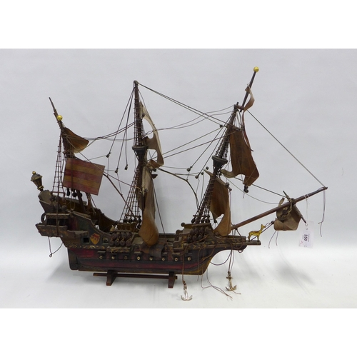 429 - The Golden Hind model ship on stand, 76cm.