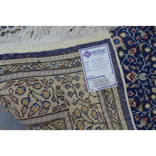 431 - Turkish, Kaysery Yun floral rug, blue foliate field and ivory border,  with certificate of guarantee... 