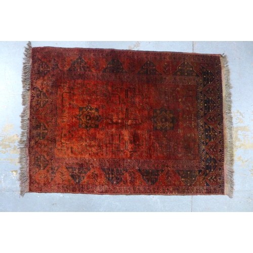 434 - Persian wool  rug with red field, 144 x 104cm.