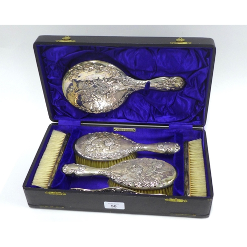 50 - George V six piece silver dressing table brush set, with Reynolds Angels pattern Birmingham 1911, in... 