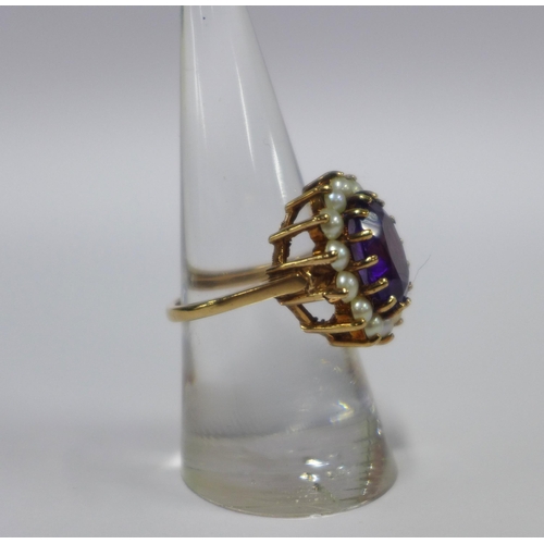 53 - Ladies 9ct gold seed pearl and amethyst dress ring, size N