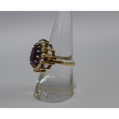 53 - Ladies 9ct gold seed pearl and amethyst dress ring, size N