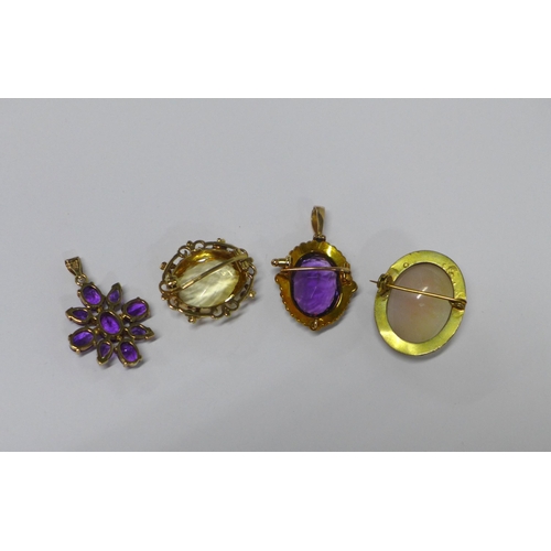 56 - 9ct gold citrine brooch, 9 ct gold amethyst flowerhead brooch, an unmarked amethyst and seed pearl b... 