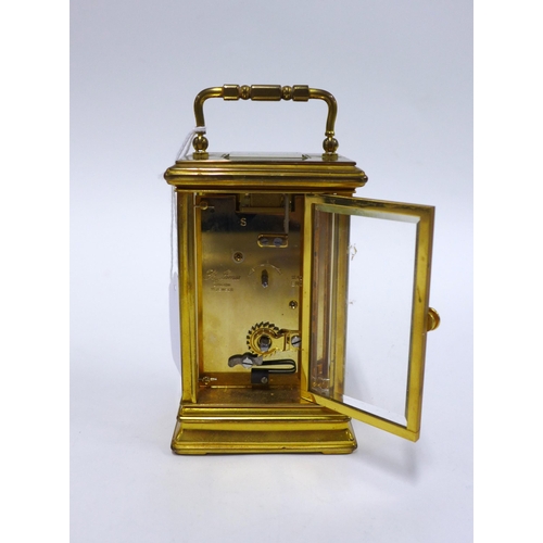 67 - St James of London brass cased carriage clock, 15cm including handle