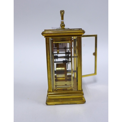 67 - St James of London brass cased carriage clock, 15cm including handle