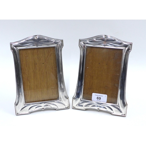 69 - A pair of George V silver photograph frames,m London 1935, 20 x 14cm (2)