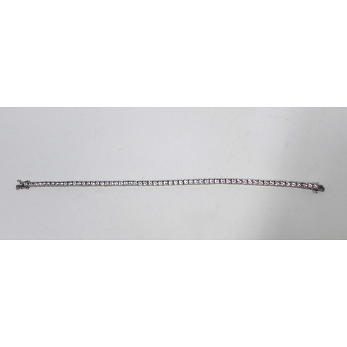 75 - 9ct white gold tennis bracelet set with CZ, stamped 375