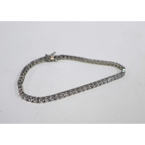 75 - 9ct white gold tennis bracelet set with CZ, stamped 375