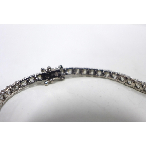 75 - 9ct white gold tennis bracelet set with CZ, stamped 375