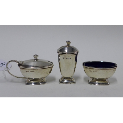 84 - George V silver three part condiment set, Birmingham 1931 (3)