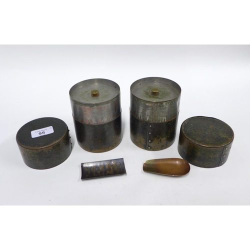 95 - Two Chinese beaten metal tea caddies with internal pewter covers and copper scoops (2) 12cm