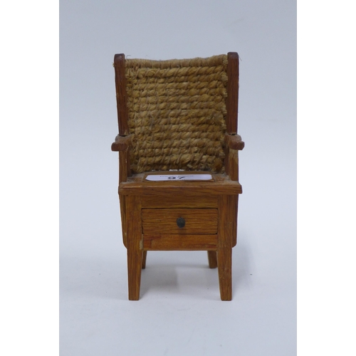 97 - Miniature Orkney chair of typical design with woven backrest and a drawer to the base, 13cm high