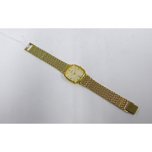 98 - ROTARY, a gold plated wrist watch,  signed champagne dial with hour baton markers and a date apertur... 