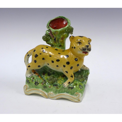 105 - Staffordshire style pottery Leopard spill vase / flatback, 18cm