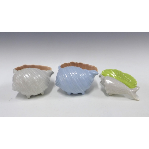 111 - Three Poole pottery twintone conch seashells, tallest 12cm (3)