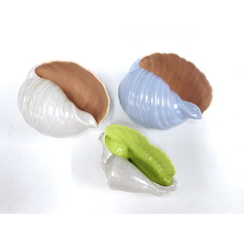 111 - Three Poole pottery twintone conch seashells, tallest 12cm (3)