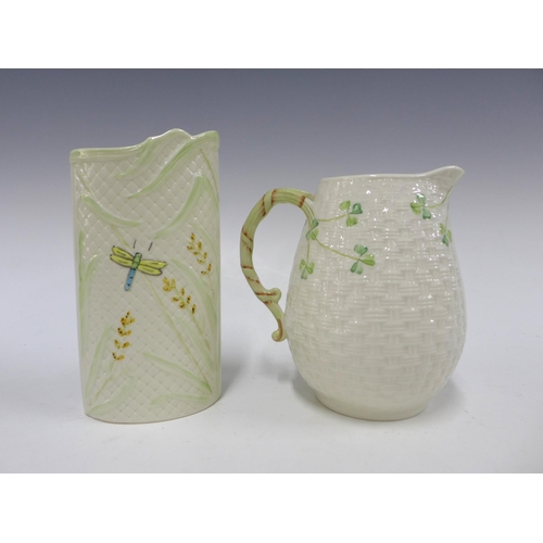 116 - Belleek jug, in a basketweave pattern with painted clovers, 16cm, together with a Belleek vase with ... 