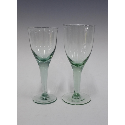 126 - Set of six green tinted wine glasses, 17.5cm, together with five similar, slightly larger glasses (1... 