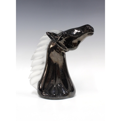 134 - SABINA GLASSWORKS, POLAND, a moulded black horse head with opaque glass mane, designed by Henryk Rys... 