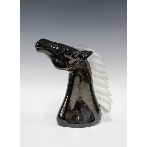 134 - SABINA GLASSWORKS, POLAND, a moulded black horse head with opaque glass mane, designed by Henryk Rys... 