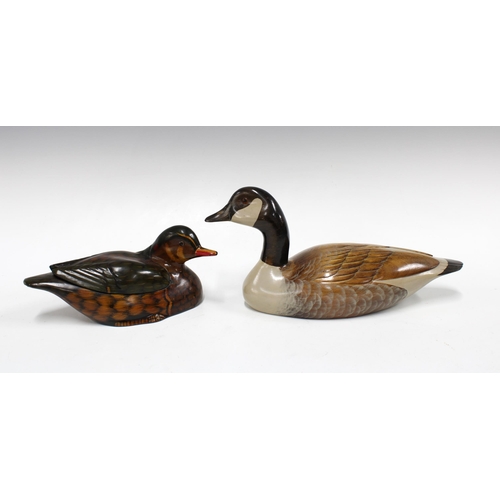 143 - Painted wooden Canada goose by David R. Jackson, signed underneath, 33 x 15cm, together with a papie... 