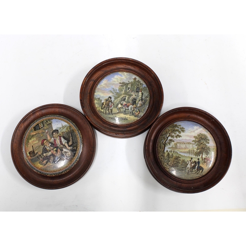 147 - Three prattware pot lids in oak frames, 16cm (3)