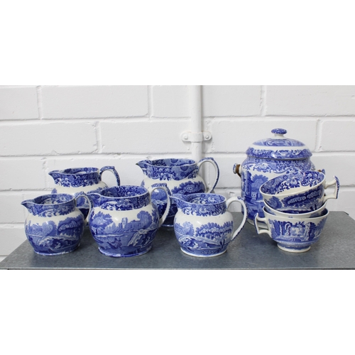 148 - Four shelves of Spode Italian blue and white tableware including jugs, tea and coffee pots, cups, eg... 