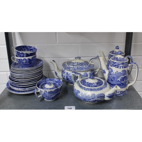 148 - Four shelves of Spode Italian blue and white tableware including jugs, tea and coffee pots, cups, eg... 