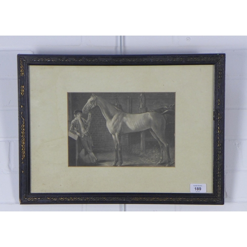 189 - Framed print of a horse with stable hand,49 x 36cm including frame