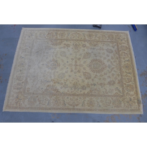 212 - Large  wool rug, beige field with foliate pattern  364 x 268cm.