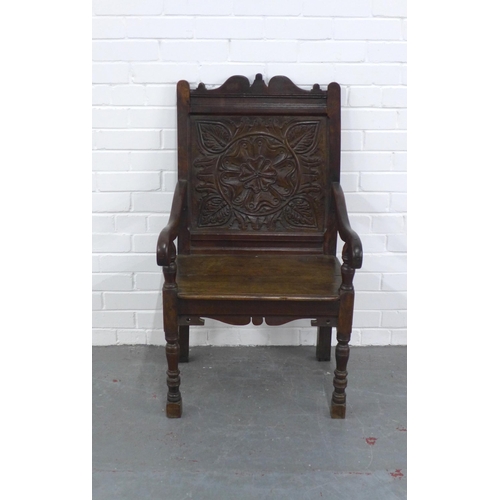 221 - Wainscot style open armchair with carved back  and solid seat,  57 x 102 x 51cm.