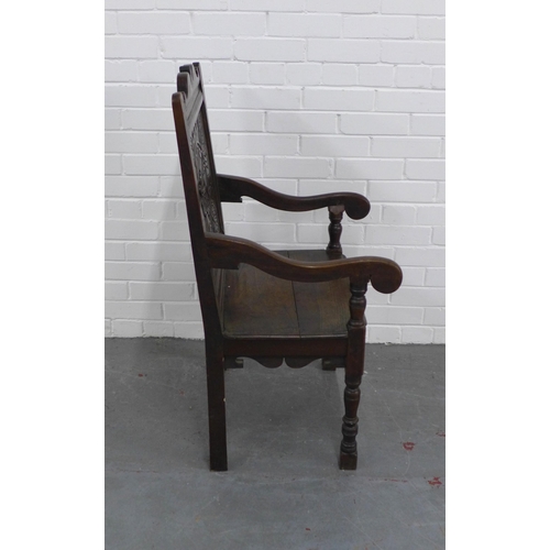 221 - Wainscot style open armchair with carved back  and solid seat,  57 x 102 x 51cm.