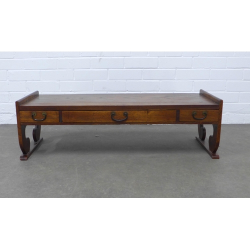 232 - Asian elm / hardwood low table with three drawers, 94 x 30 x 36cm.