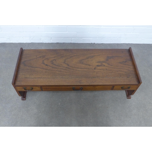 232 - Asian elm / hardwood low table with three drawers, 94 x 30 x 36cm.