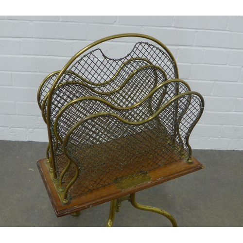 237 - An Edwardian oak and brass newspaper / magazine rack by William Tonks & Son, 42 x 74cm.