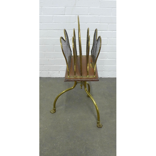 237 - An Edwardian oak and brass newspaper / magazine rack by William Tonks & Son, 42 x 74cm.