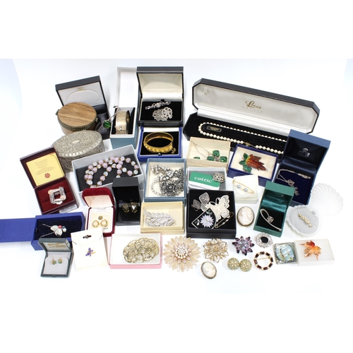 24 - A collection of vintage and later costume jewellery together with some silver jewellery to include a... 