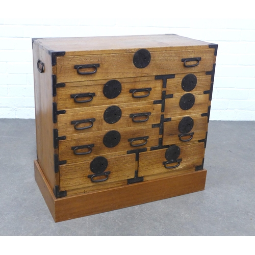 241 - An Asian apothecary style chest , perhaps Korean, with an arrangement of drawers with iron handles, ... 