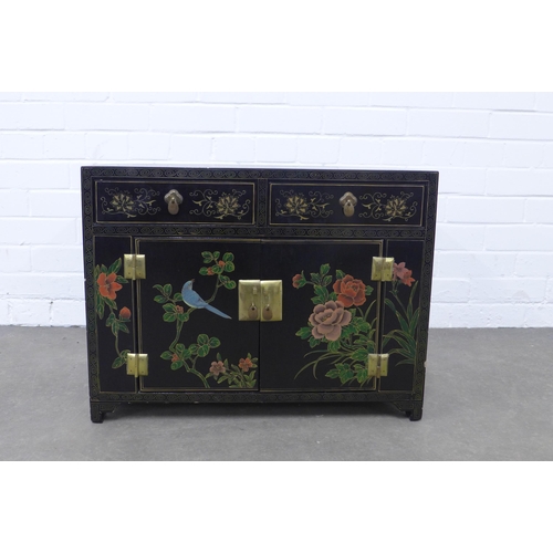 247 - Black lacquered cabinet, decorated with stylised flowers and birds,  61 x 46 x 3cm.