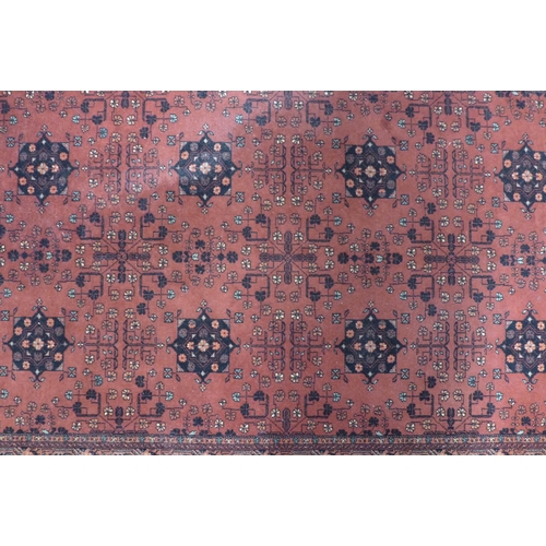 249 - Modern wool rug, red field, retailed by John Lewis, 160 x 240cm.